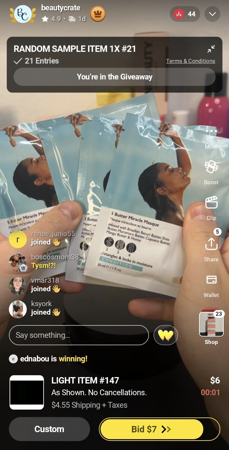 Screenshot of a beautycrate Whatnot live show with hair-mask samples, chat, and live bidding